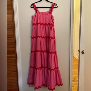 Pink Maxi Dress with red ricrac details 
Non adjustable straps 
Zip up side